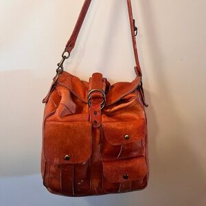 Vintage 1970's orange leather satchel with brass details